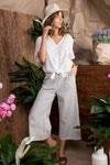 Ruffle eyelet top