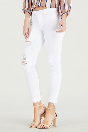 Mid Rise destroy hem cropped skinny jeans