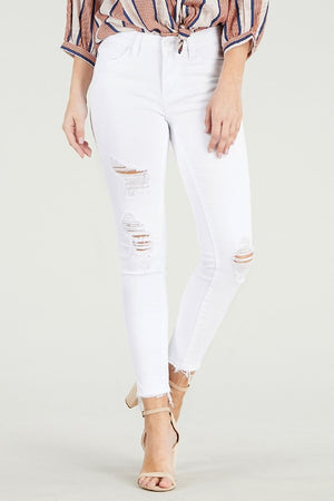 Mid Rise destroy hem cropped skinny jeans