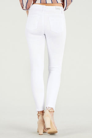 Mid Rise destroy hem cropped skinny jeans